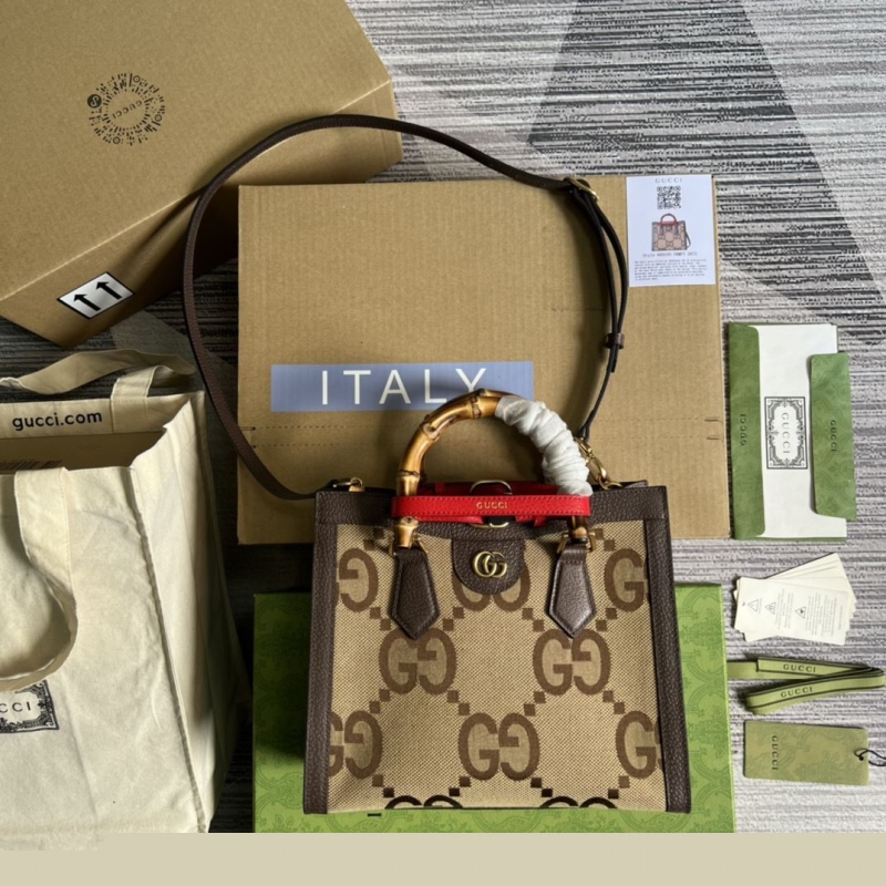 G*u*i top handle bags